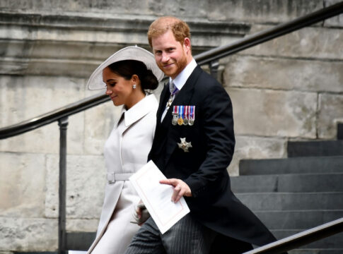 prince harry walking down outdoor stairs together